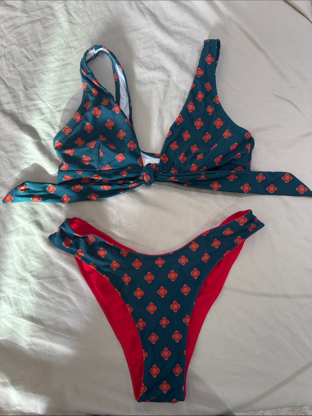 Reversible Teal Patterned Tie-Front Bikini Set with Red Accents
